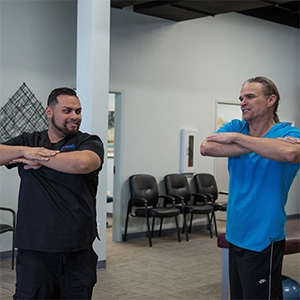 Hector Montano With Rehab Patient