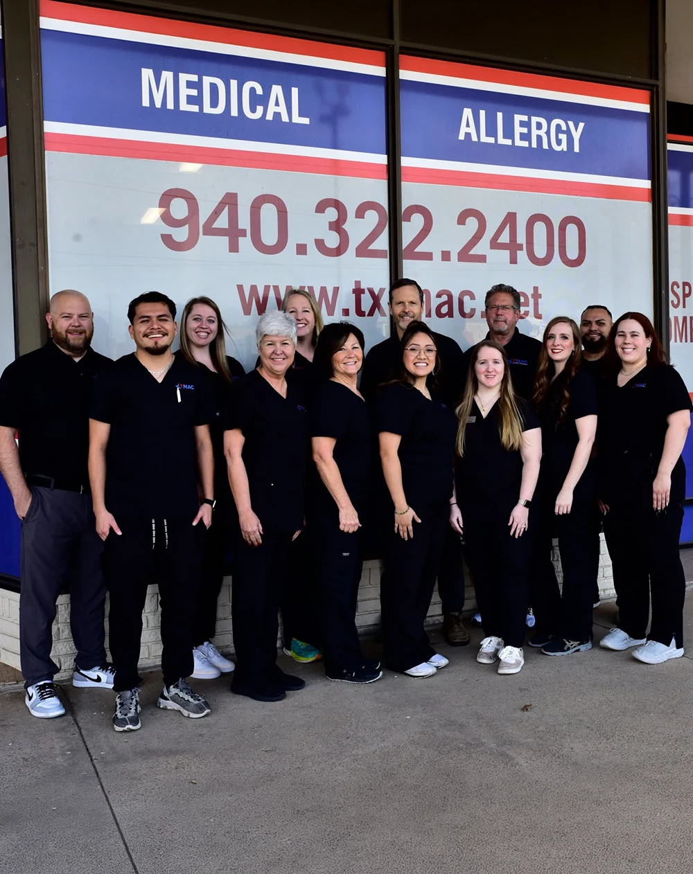 Chiropractor Cari Guidry And Stewart Chapman With Team